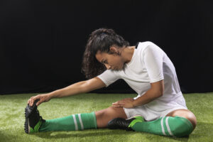full-shot-woman-sportswear-stretching
